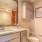bathroom with a large mirror